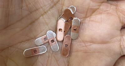 Пошиљка за штанцање од сребрне уметне траке